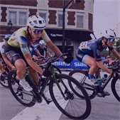 photo of cyclist racing in downtown Lombard