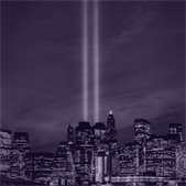 photo of New York Skyline with twin towers memorial lights shining in sky 