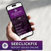 hand holding smartphone displaying seeclickfix homepage 