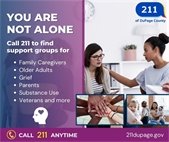 A graphic from 211 of DuPage County with the message “You Are Not Alone.” It encourages residents to call 211 anytime to find support groups for family caregivers, older adults, grief, parents, substance use, veterans, and more. The image shows people offering comfort and support, a group joining hands, and a parent group with children. The 211 of DuPage County logo and website 211dupage.gov are displayed.
