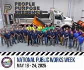 photo of public works group in front of snow plow