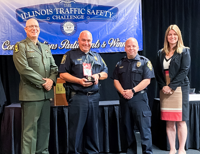 Lombard police group photo with award