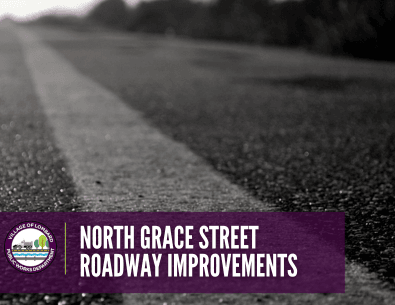 black and white photo of roadway and public works logo with text 